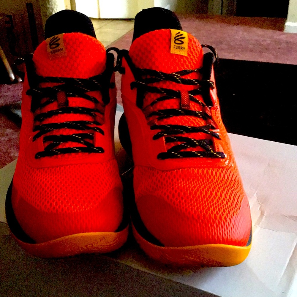 Selling Stephen Curry shoes orange yellow and black for $100
